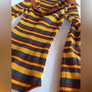 Out from under women’s XS polo fitted body suit.